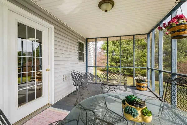 a bedroom with a bed and dresser