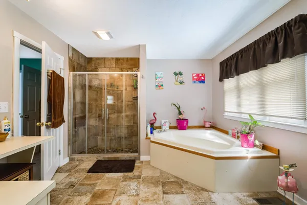 a bedroom with a bed and a closet