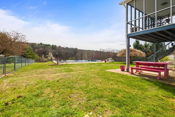 a view of a potted plant sitting in front of a house