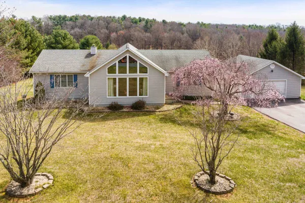 a house with trees in front of it