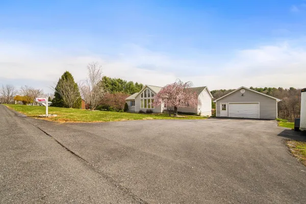 a view of a house with garage