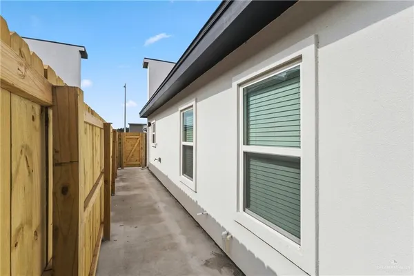 a house view with a backyard space