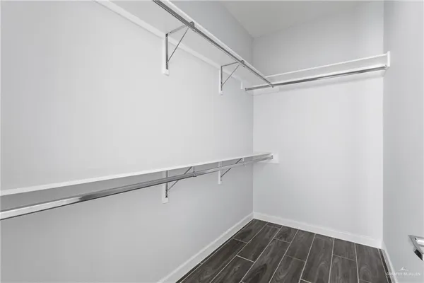 a view of a room with racks on the wall