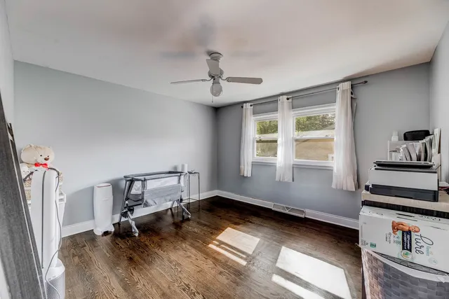 a room with furniture and a window