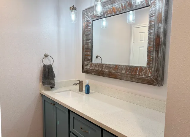 a bathroom with a toilet and a bathtub