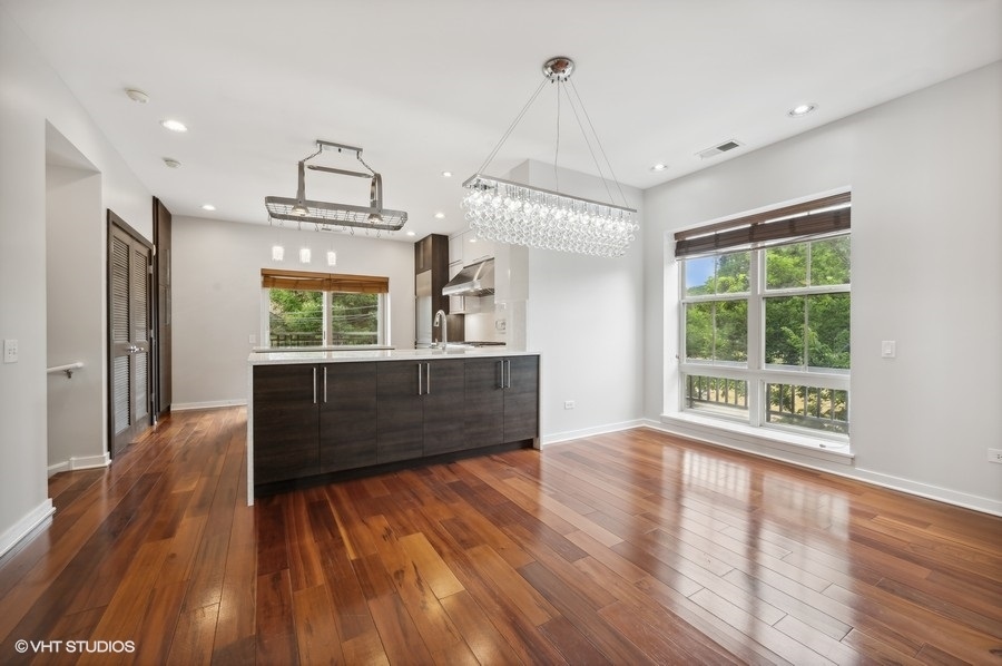 1231 West Arthington Street Chicago, IL 60607 - Photo 12 of 34 a view of kitchen with furniture and wooden floor