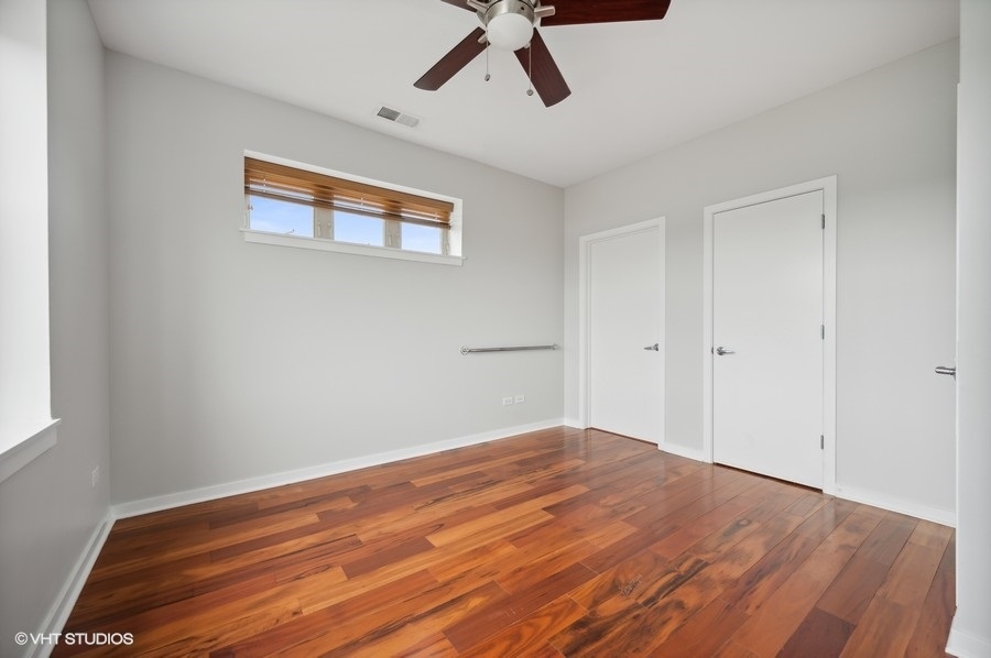 1231 West Arthington Street Chicago, IL 60607 - Photo 20 of 34 a view of empty room with wooden floor