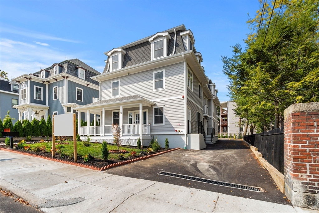 59 Perrin Street, Unit 1 Boston, MA 02119 - Photo 30 of 33 a front view of a house with street