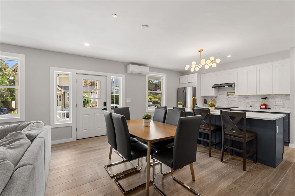 59 Perrin Street, Unit 1 Boston, MA 02119 - Photo 5 of 33 a view of a dining room with furniture