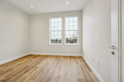 a view of living room with a potted plant