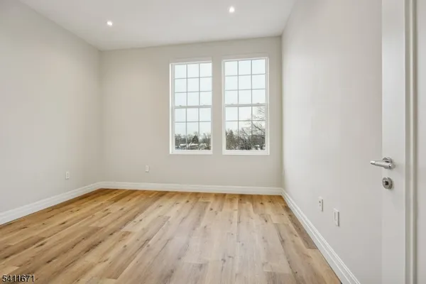 a view of living room with a potted plant