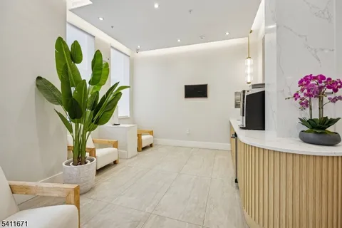 a view of a hallway with a white walls