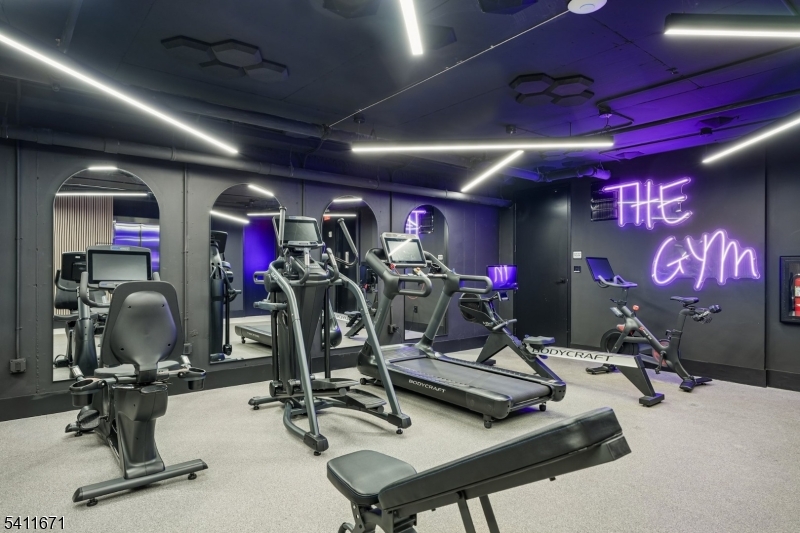 1722 Springfield Avenue, Unit 402 Maplewood, NJ 07040 - Photo 7 of 34 a view of a room with gym equipment