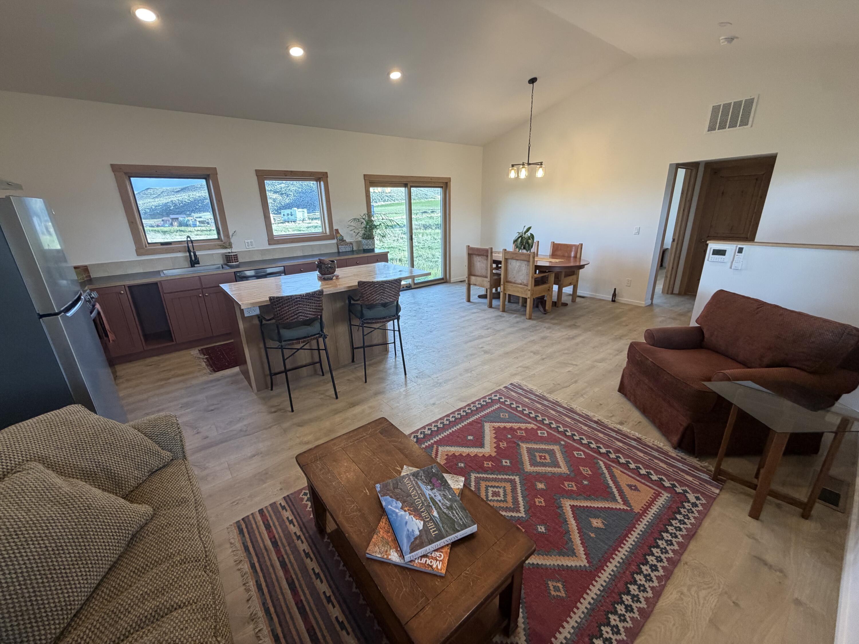 159 Foothill Road Carey, ID 83320 - Photo 7 of 24 Open living,kitchen,dining w: views