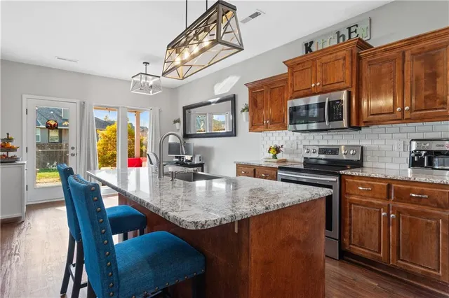 $335,000 | 802 Northwest Green Drive, Grain Valley, MO 64029