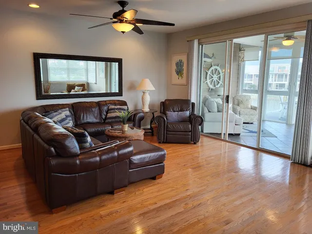 a view of building with river in front of it