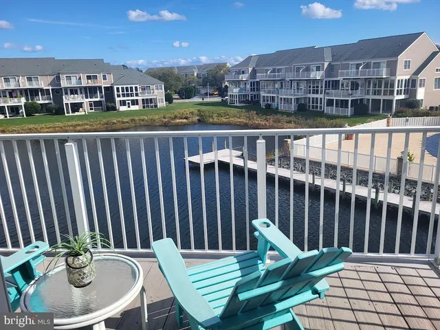 an aerial view of lake residential house with outdoor space