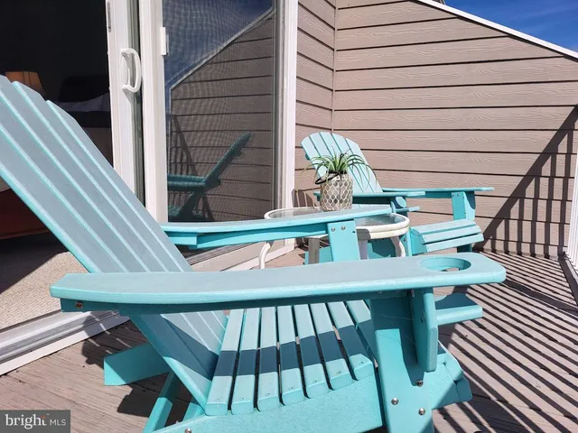 an aerial view of a house with yard swimming pool and outdoor seating