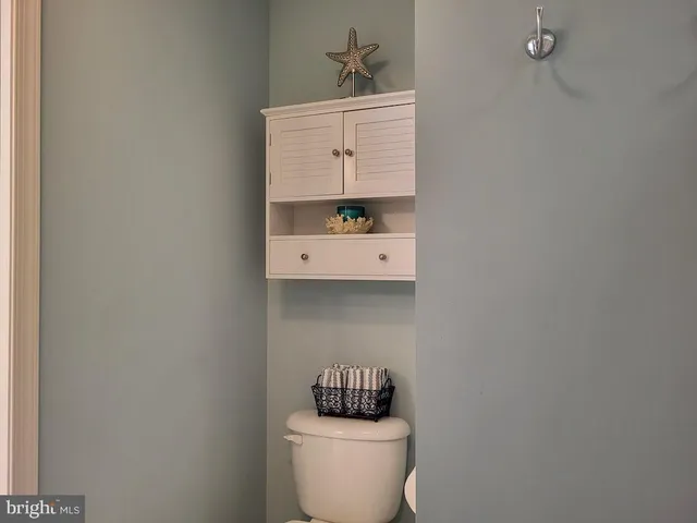 an aerial view of a house with a ocean view