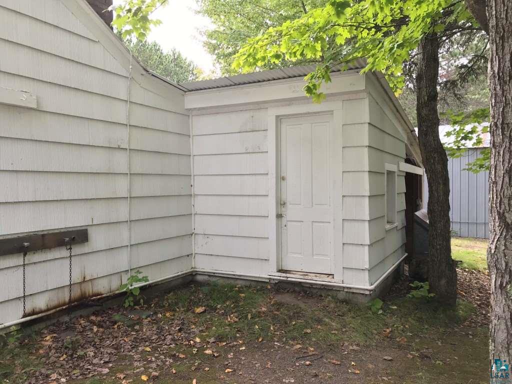 6307 Industrial Road Saginaw, MN 55779 - Photo 16 of 20 Playhouse behind garage