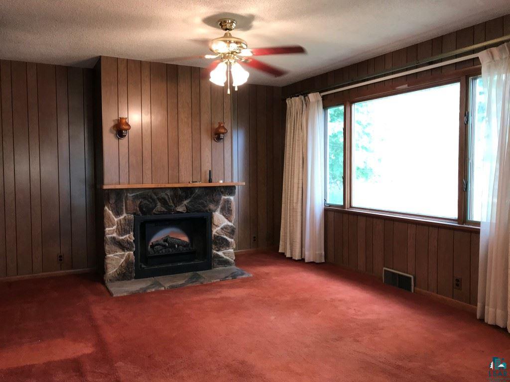 6307 Industrial Road Saginaw, MN 55779 - Photo 8 of 20 Living room with fireplace