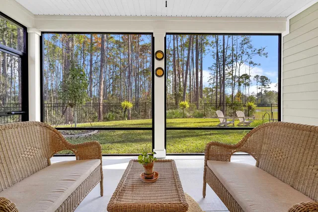 a garden with tall trees