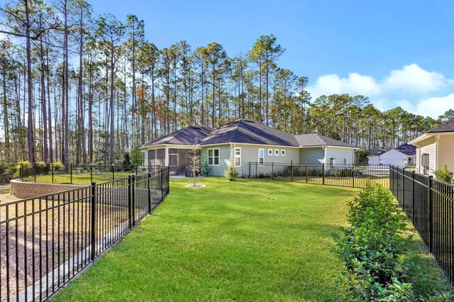 a view of a house with swimming pool