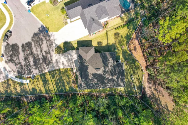 a view of a lake with a yard