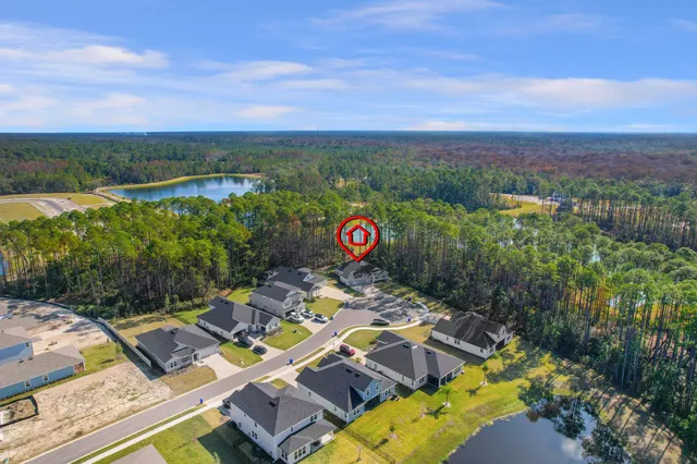 a view of a swimming pool with a lounge chairs