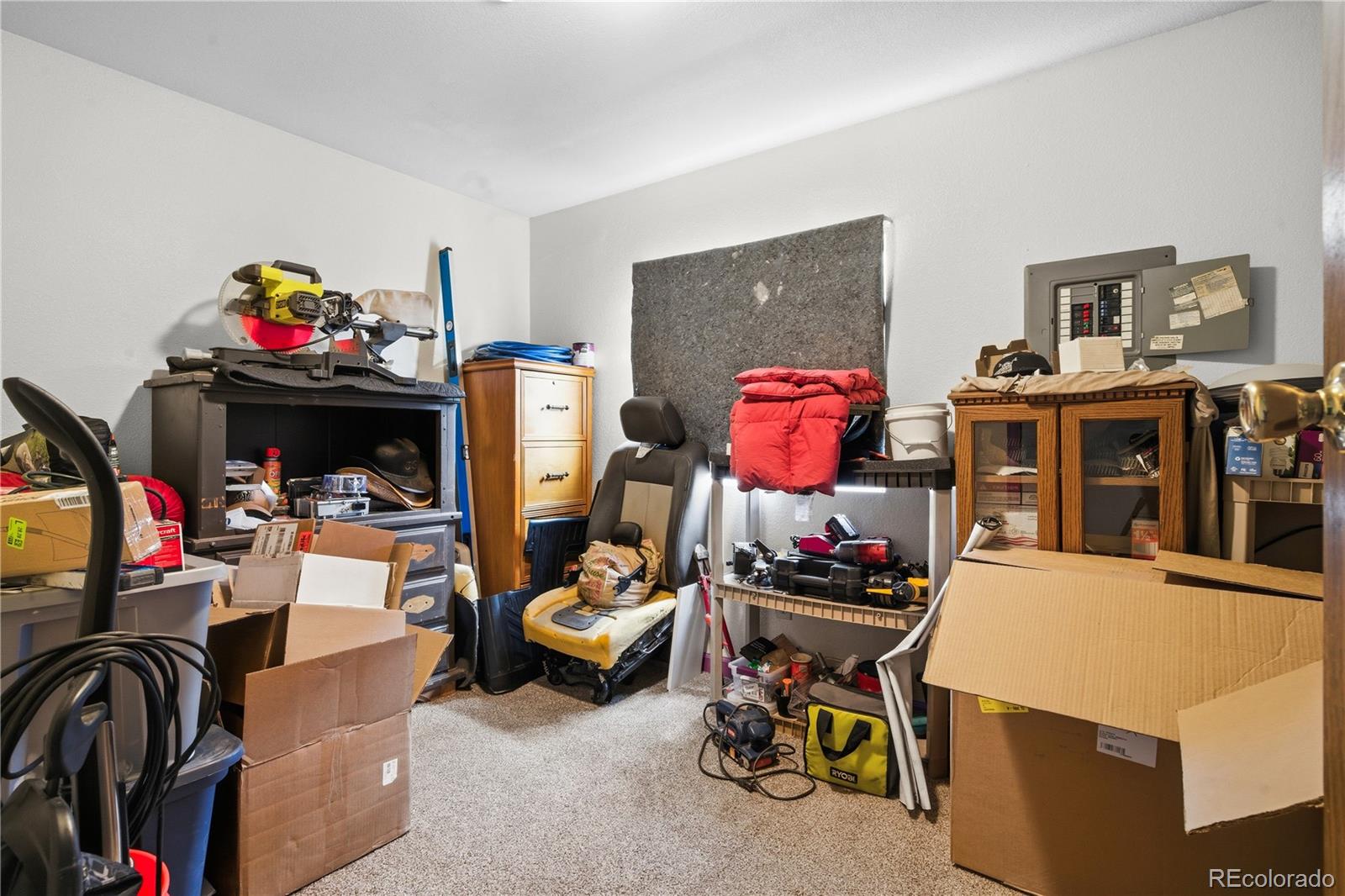 12205 Perry Street Broomfield, CO 80020 - Photo 11 of 22 a view of a room with workspace and toys