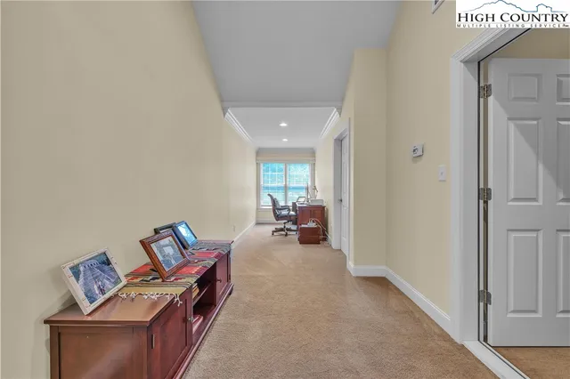 a room with furniture and gym equipment