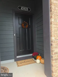 a front view of a house with a garage