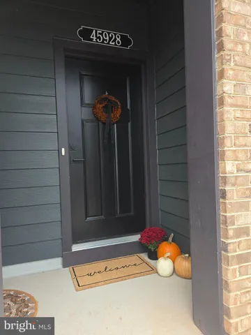 a front view of a house with a garage