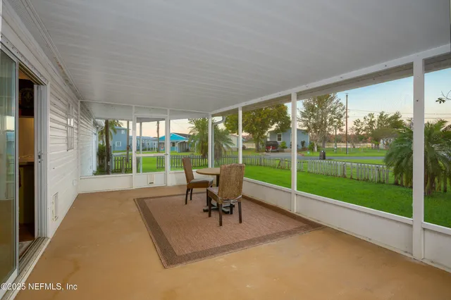 a view of a room with porch and patio