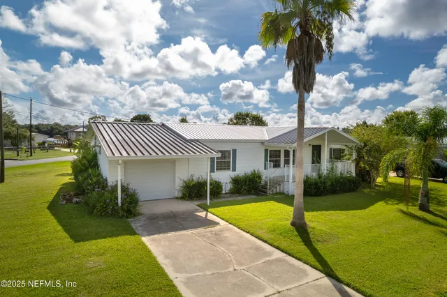 a view of a house with a swimming pool