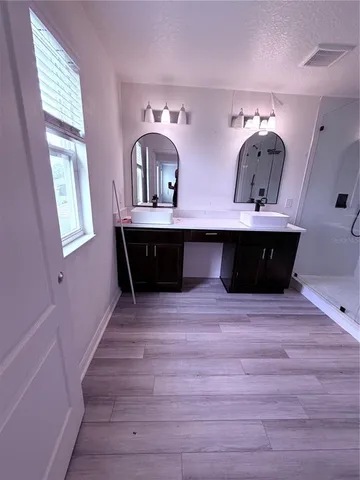 an aerial view of a house having yard