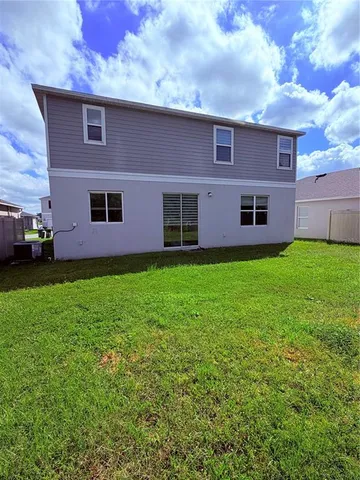 a sign that is sitting on a wooden floor