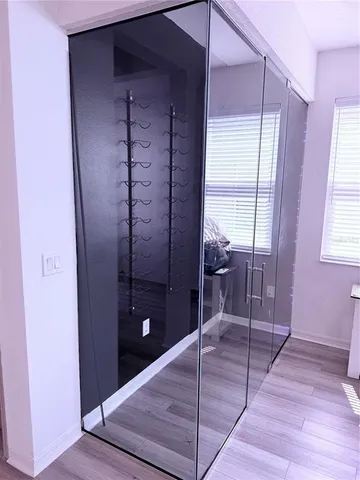 an aerial view of residential houses with outdoor space and street view