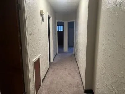 a view of a hallway with hallway