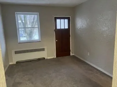 an empty room with windows