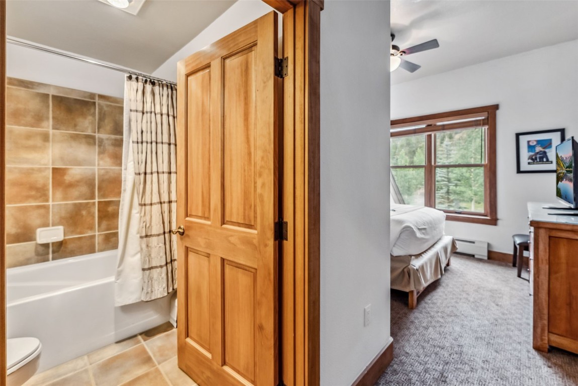 231 Hawk Circle, Unit 2324 Keystone, CO 80435 - Photo 19 of 48 a spacious bathroom with a bathtub and a shower