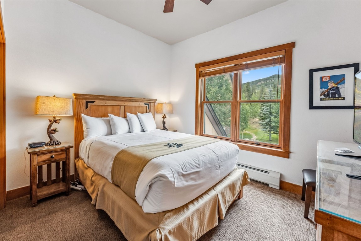 231 Hawk Circle, Unit 2324 Keystone, CO 80435 - Photo 21 of 48 a bedroom with a bed and a window