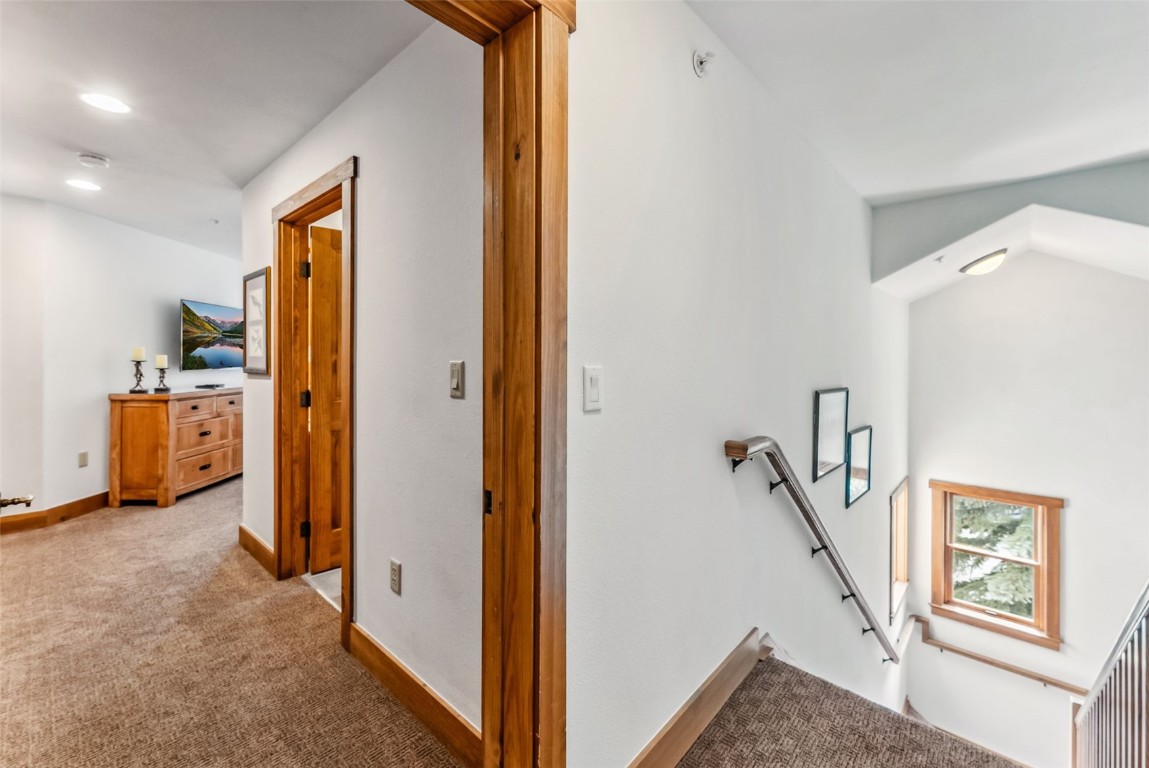 231 Hawk Circle, Unit 2324 Keystone, CO 80435 - Photo 25 of 48 a view of a hallway with workspace and entryway