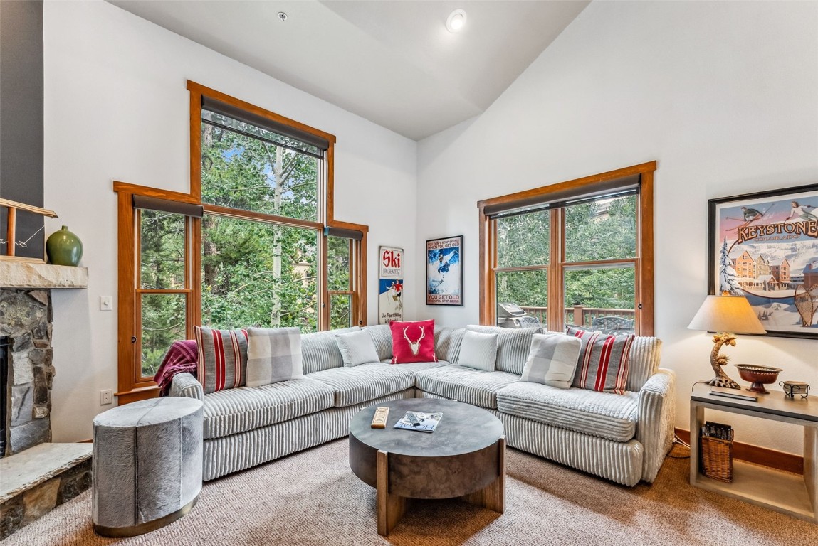 231 Hawk Circle, Unit 2324 Keystone, CO 80435 - Photo 7 of 48 a living room with furniture and a large window