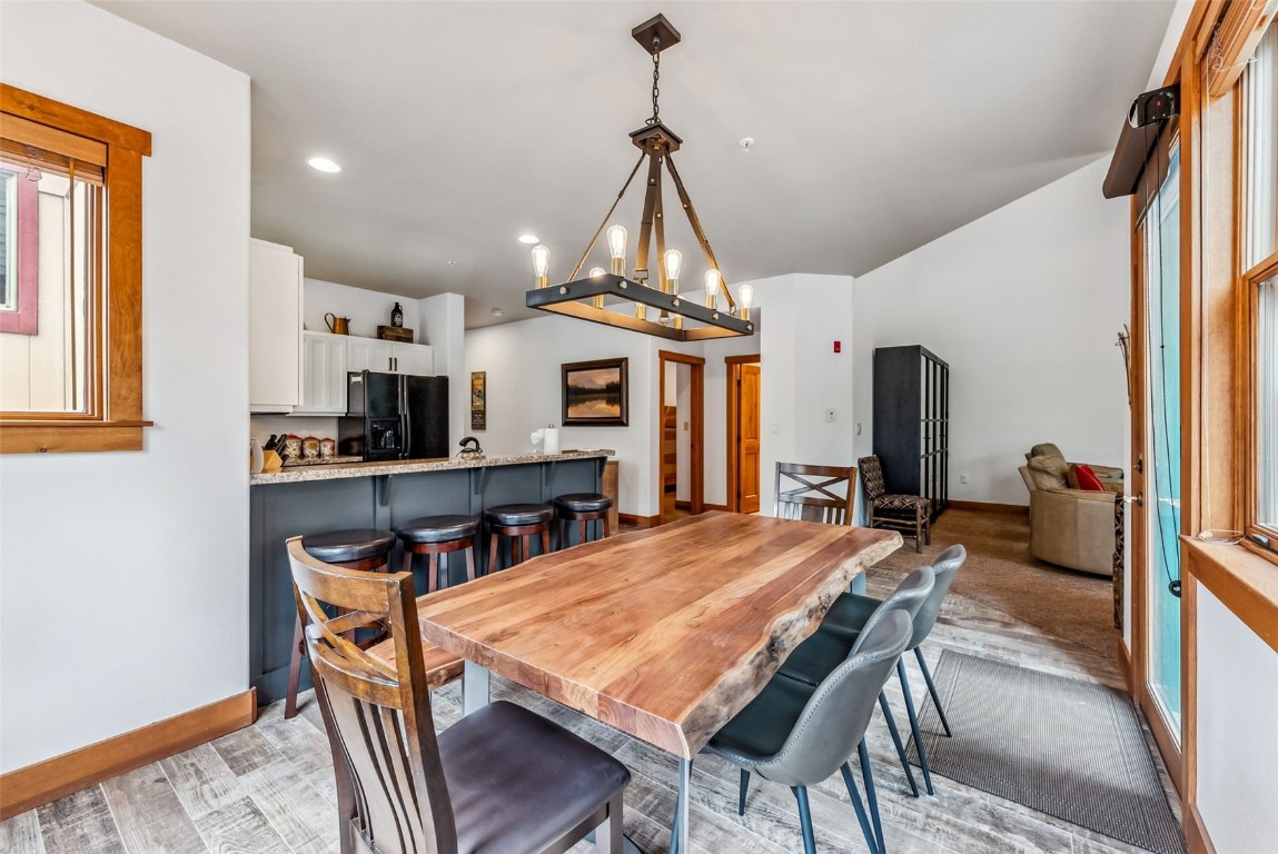 231 Hawk Circle, Unit 2324 Keystone, CO 80435 - Photo 10 of 48 a view of a dining room with furniture