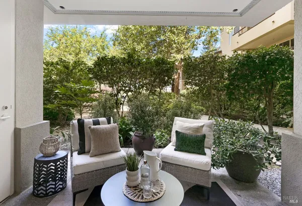 a outdoor living space with furniture and garden view