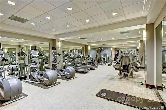 230 South Tryon Street, Unit 1109 Charlotte, NC 28202 - Photo 11 of 17 a view of a room with gym equipment