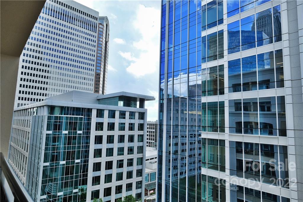230 South Tryon Street, Unit 1109 Charlotte, NC 28202 - Photo 17 of 17 a front view of a tall building