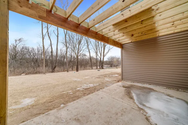 a kitchen with stainless steel appliances a sink stove and refrigerator