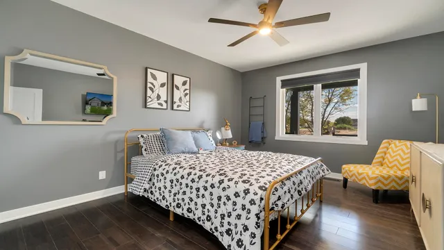 a balcony with wooden floor and outdoor seating